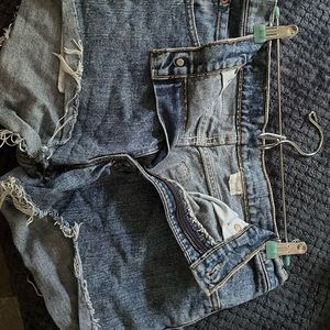 Blue Levi’s jeans shorts.